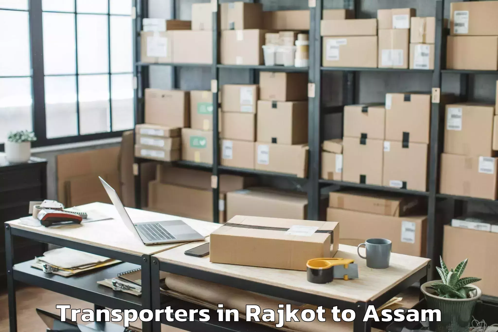 Book Rajkot to Patharighat Transporters